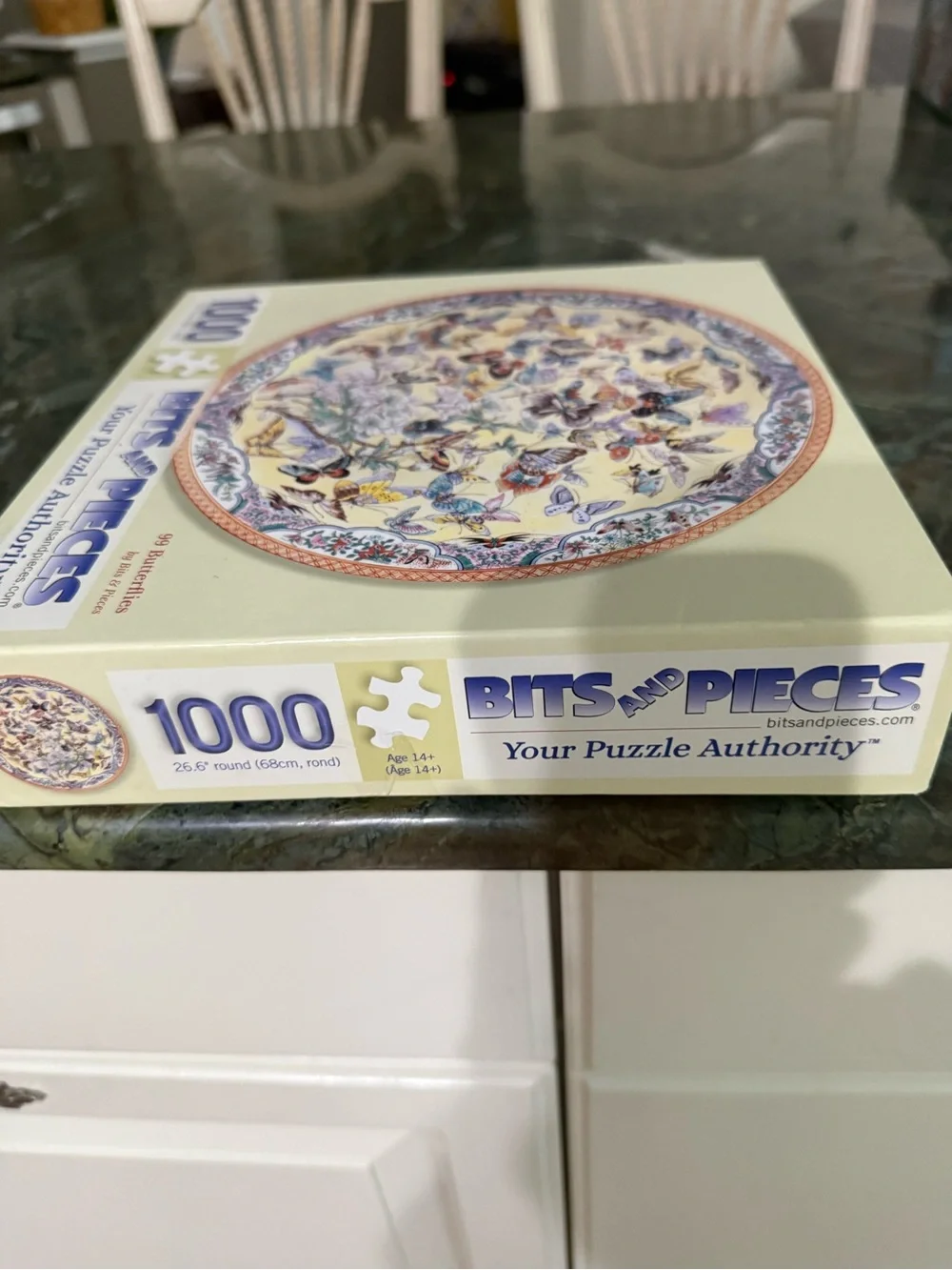 1000-Piece 99 Butterflies Round Puzzle - Cream/Blue